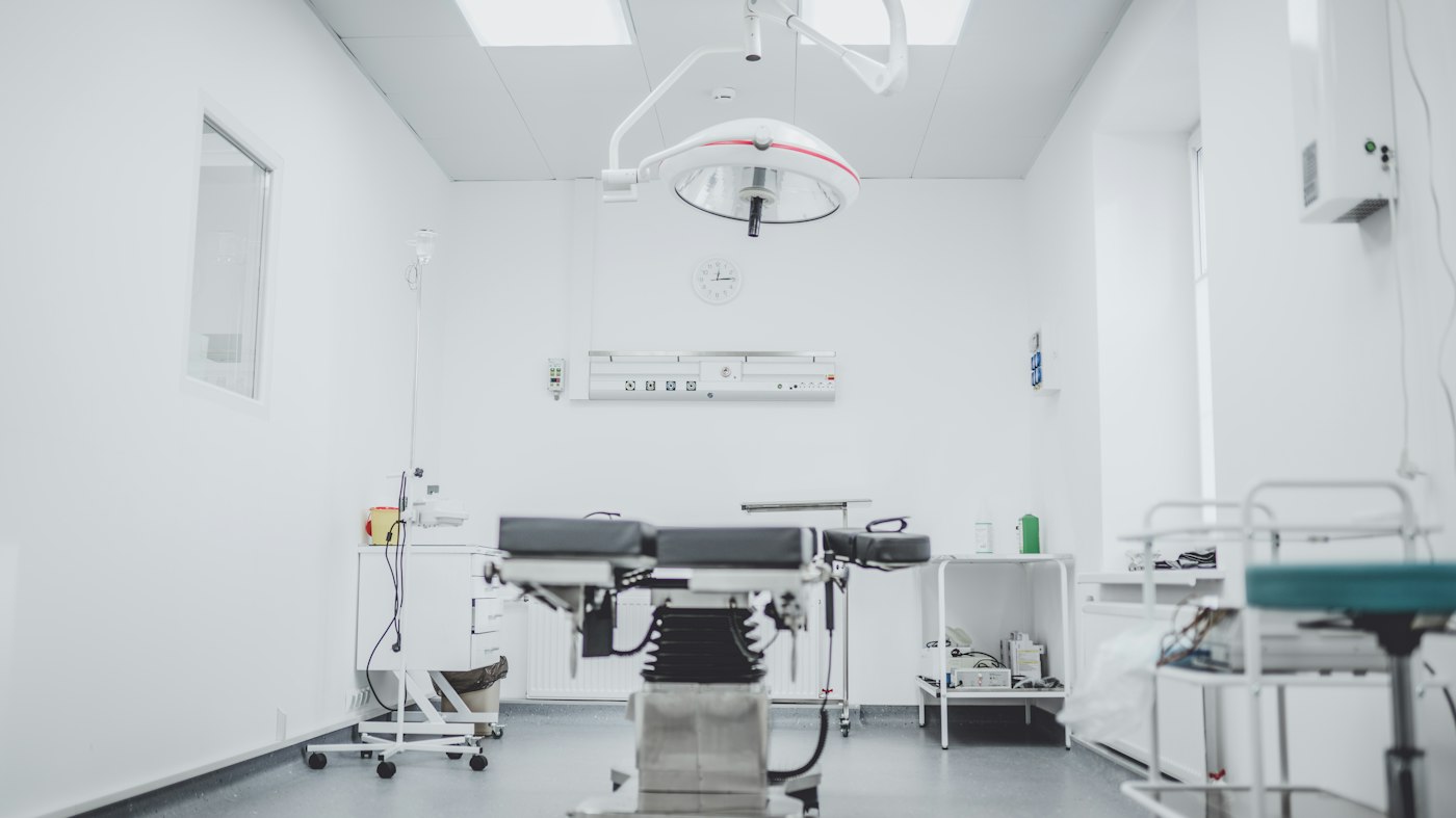 A clean, white consultation and examination room